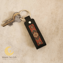 Load image into Gallery viewer, The Safar Strap: Luxury Black Leather &amp; Persian Patterned Key Fob Keychain